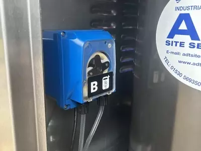 High-pressure chemical dosing pump installed inside a Nilfisk 400HS DTE system. Allows chemical to be applied directly through the pump at pressure for deeper cleaning and improved efficiency on heavy-duty applications.